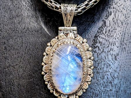 Illuminating Moonstone Pendant with Exquisite Scrollwork Online now