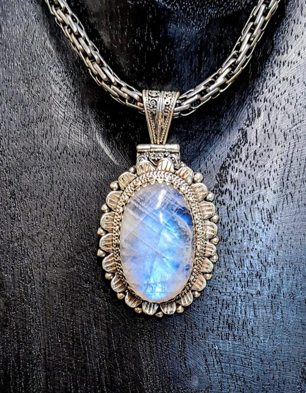 Illuminating Moonstone Pendant with Exquisite Scrollwork Online now